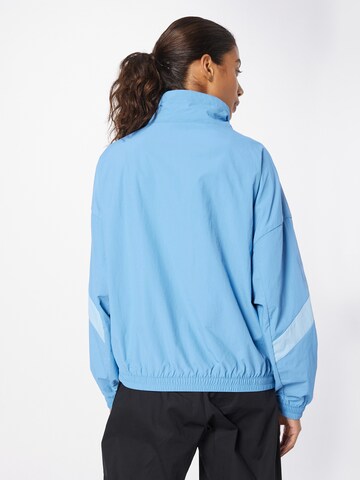 new balance Prehodna jakna 'Athletics' | modra barva