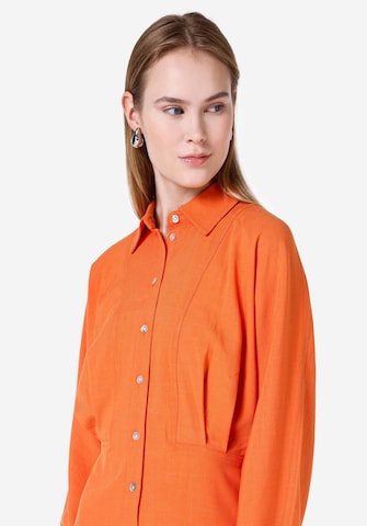 Colin's Blousejurk in Oranje