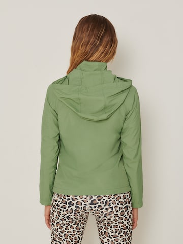 ABOUT YOU x Sofia Tsakiridou Overgangsjakke 'Melek' i grønn