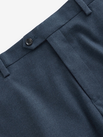 Coupe slim Pantalon à plis Next en bleu