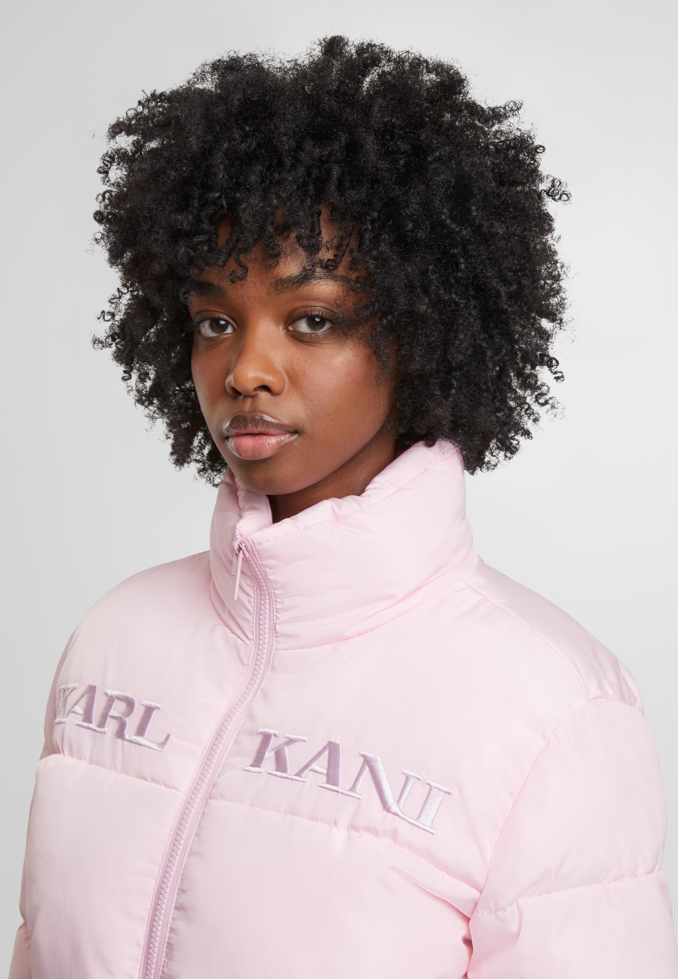 Karl Kani Winter Jacket 'Retro Essential' in Pastel Pink | ABOUT YOU