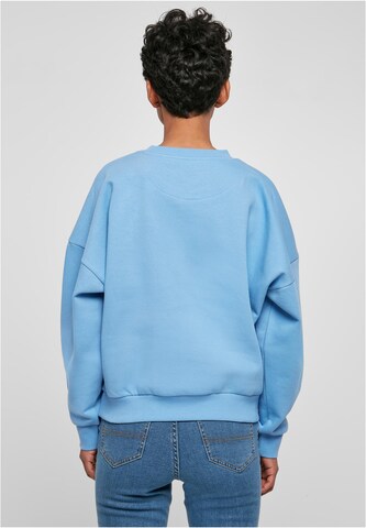 Sweat-shirt Karl Kani en bleu