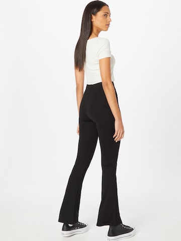 Trendyol Flared Pants in Black