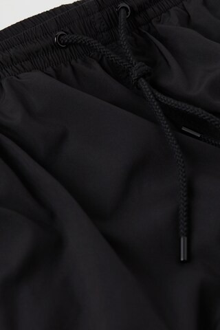 INTIMISSIMI Board Shorts in Black