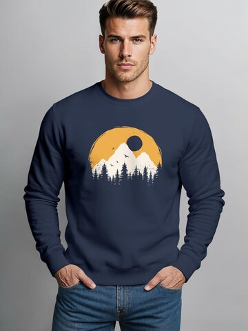 Neverless Sweatshirt 'Berge Sonne'‌‌‌‌‌‌‌‌‌‌ in Blau