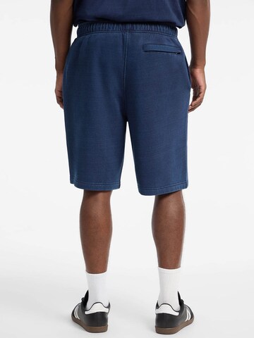 GUESS Loose fit Pants in Blue