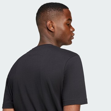 ADIDAS SPORTSWEAR - Camiseta funcional en negro