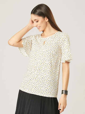 Quiosque Blus i vit: framsida