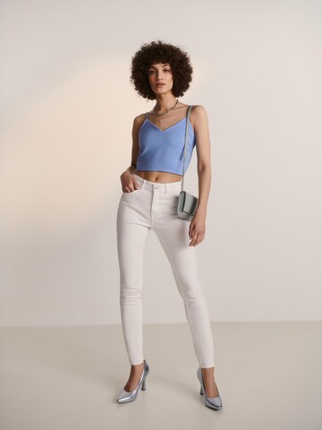 Guido Maria Kretschmer Women Skinny Jeans in White