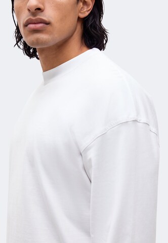 WEEKDAY T-shirt i vit: sida