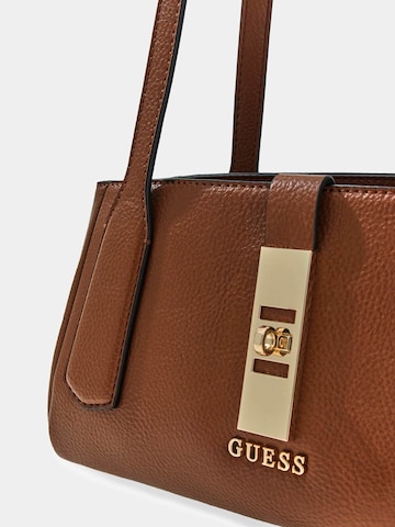 GUESS Schultertasche in Braun