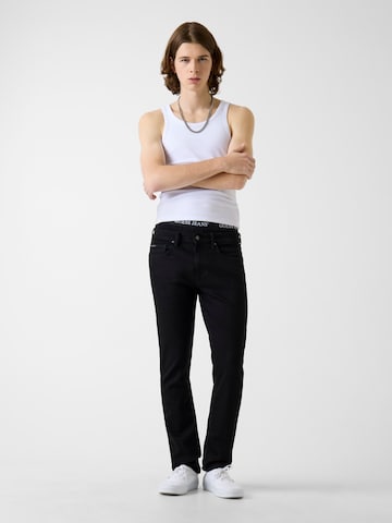 GUESS JEANS Štandardný strih Džínsy 'GJ' - Čierna