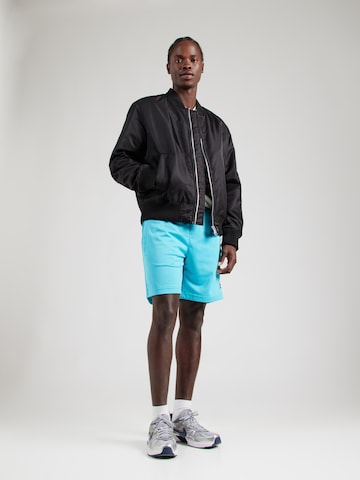 Nike Sportswear Szabványos Nadrág - kék
