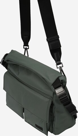 Calvin Klein Чанта за през рамо тип преметка в зелено: отпред
