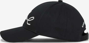 melns Karl Lagerfeld Naģene: no priekšpuses