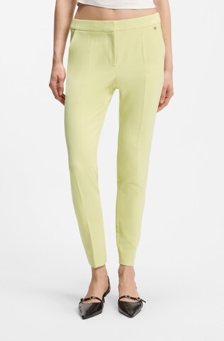 HUGO Slim fit Pants 'Hagonia-1' in Green: front
