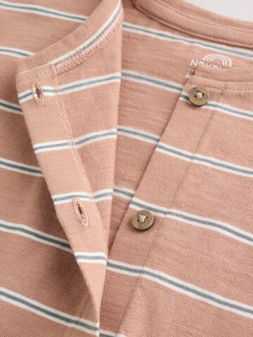 Next Sparkdräkt/body i beige