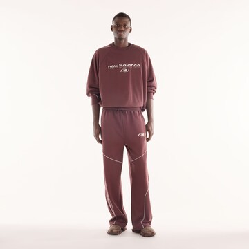 Wide leg Pantaloni 'Trackside French Terry Pant' di new balance in rosso