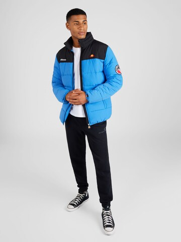 ELLESSE Демисезонная куртка в Синий