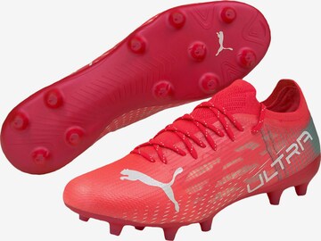 Chaussure de foot PUMA en rouge : devant