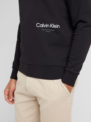 Calvin Klein Μπλούζα φούτερ 'OFF PLACEMENT' σε μαύρο