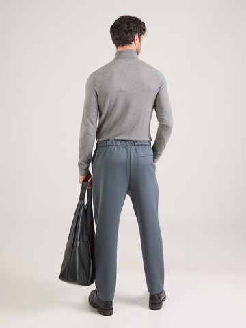 Regular Pantalon à plis Calvin Klein en bleu : derrière