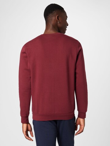 ADIDAS SPORTSWEAR - Sweatshirt de desporto 'Essentials' em vermelho