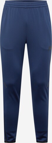 Tapered Pantaloni sportivi 'Tenacity' di new balance in blu: frontale