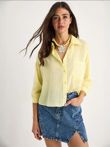 Bianco Lucci - Blusa em amarelo: frente