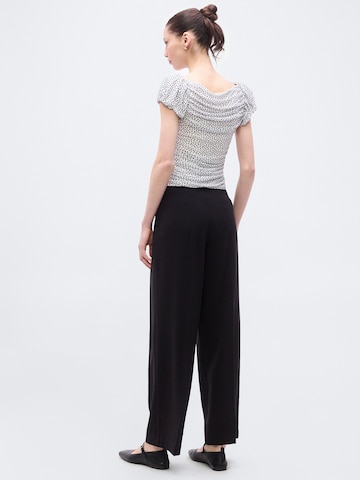 Chemisier Gina Tricot en blanc