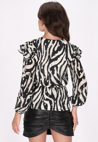 Camicia da donna di faina in nero