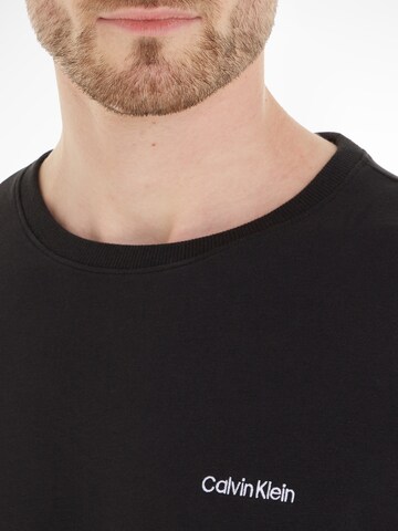 Calvin KleinSweater majica - crna boja