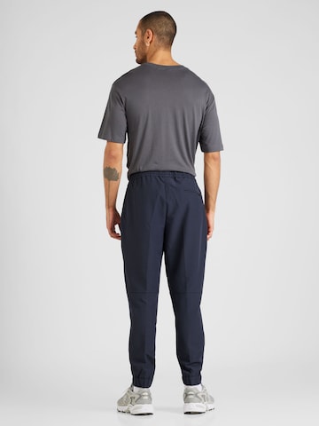 BOSS - Tapered Pantalón de pinzas 'Flex' en azul