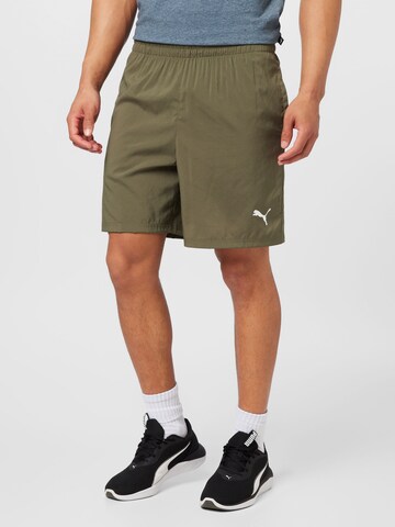 PUMA Обычный Спортивные штаны в Зеленый: спереди