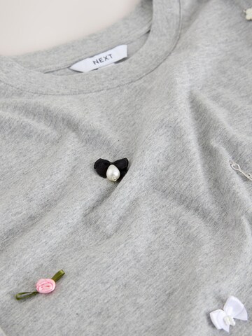 Maglietta di Next in grigio