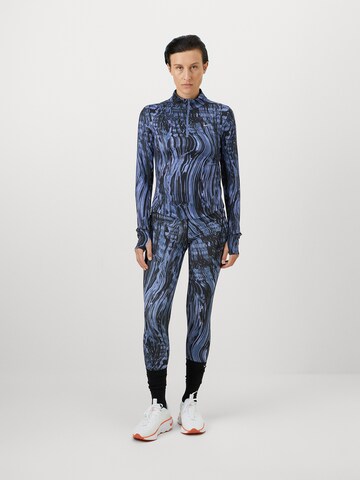 NIKE Skinny Παντελόνι φόρμας 'SWIFT' σε μπλε