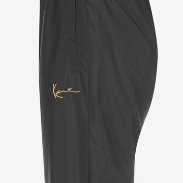 Karl Kani Regular Pants in Black