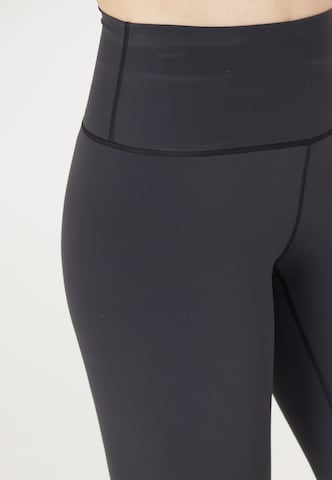 Athlecia Skinny Tights 'Stay' in Schwarz