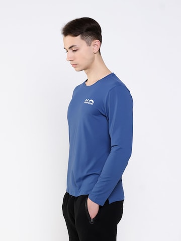 neverover - Camiseta funcional en azul