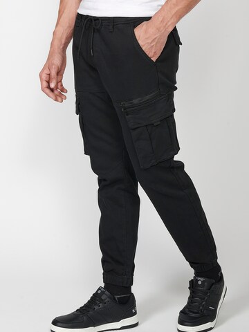 KOROSHI Tapered Cargo trousers in Black