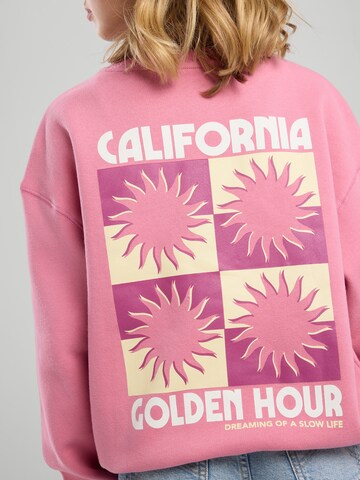 Sweat-shirt America Today en rose