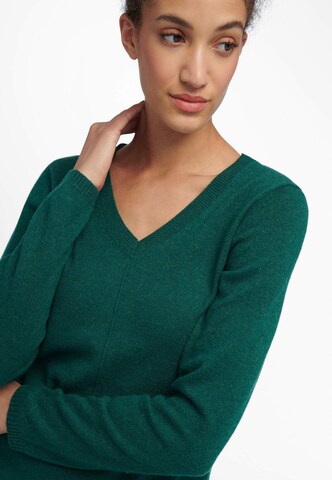 Pull-over include en vert