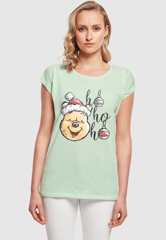 ABSOLUTE CULT T-Shirt 'Winnie The Pooh - Ho Ho Ho Baubles' in Grün: predná strana