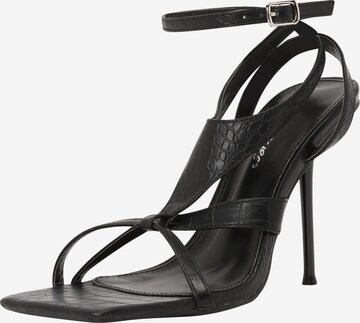 Public Desire - Sandalias con hebilla 'HARNESS' en negro: frente