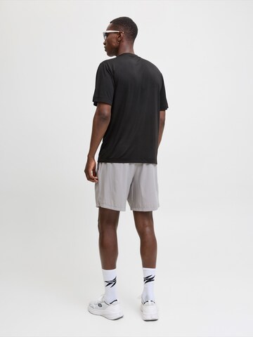 JACK & JONES - Camiseta 'JCOCNZAMSTERDAM' en negro