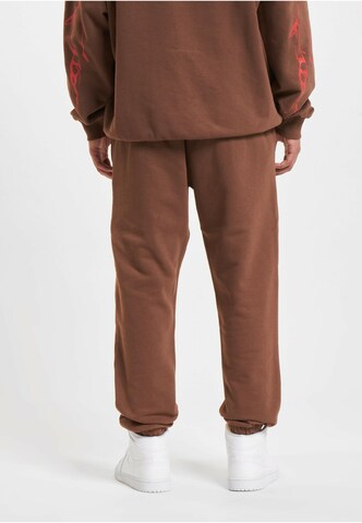 Thug Life Loosefit Sportbroek 'Thug Life Ink' in Bruin