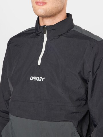 OAKLEY Sportjacke in Schwarz