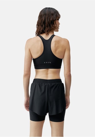 Born Living Yoga Bustier Sport-BH 'Bikila' in Schwarz