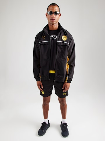 PUMA - Chaqueta deportiva 'BVB FtblStatement Cellerat' en negro