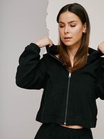A LOT LESS Zip-Up Hoodie 'Tessa' in Black: front
